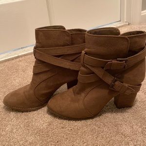 Worn cute brown booties